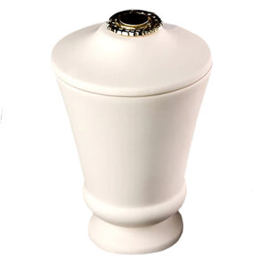 A tall urn with a metal tip